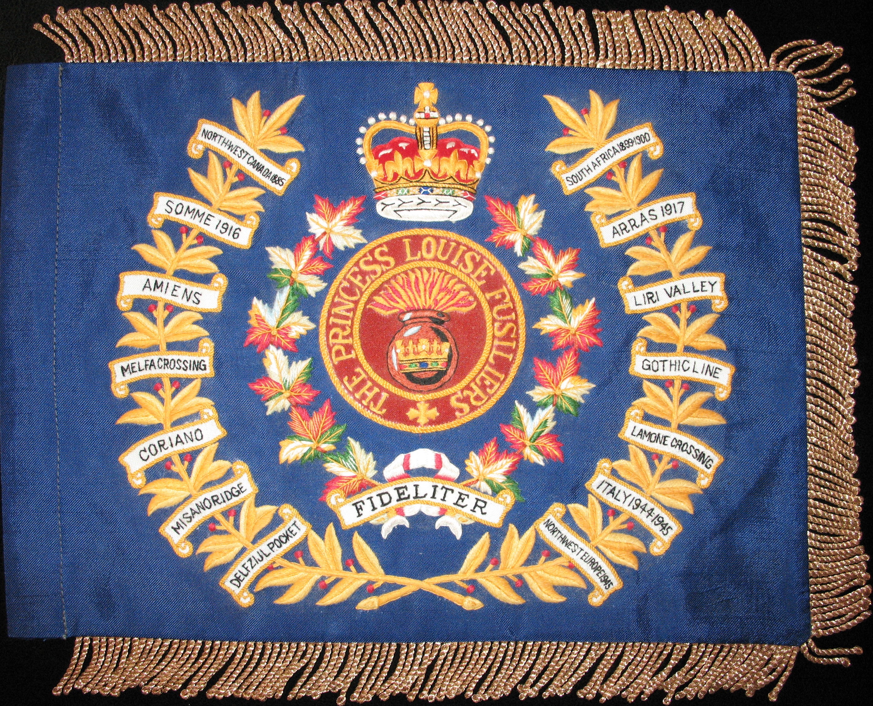 Colour of the Princess Louise Fusiliers Regiment with battle honours stitched onto the flag